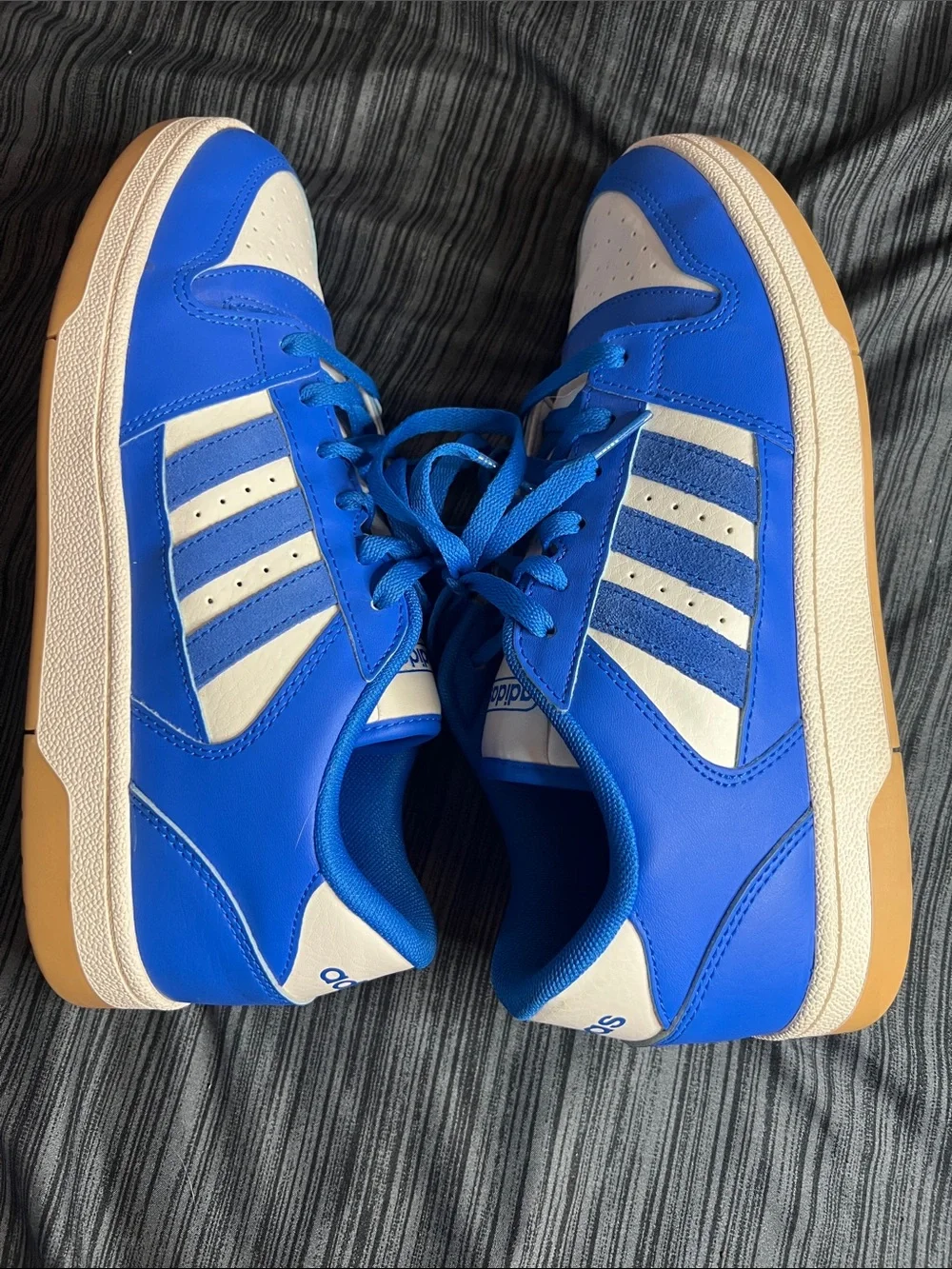 Adidas Break Start sneakers.